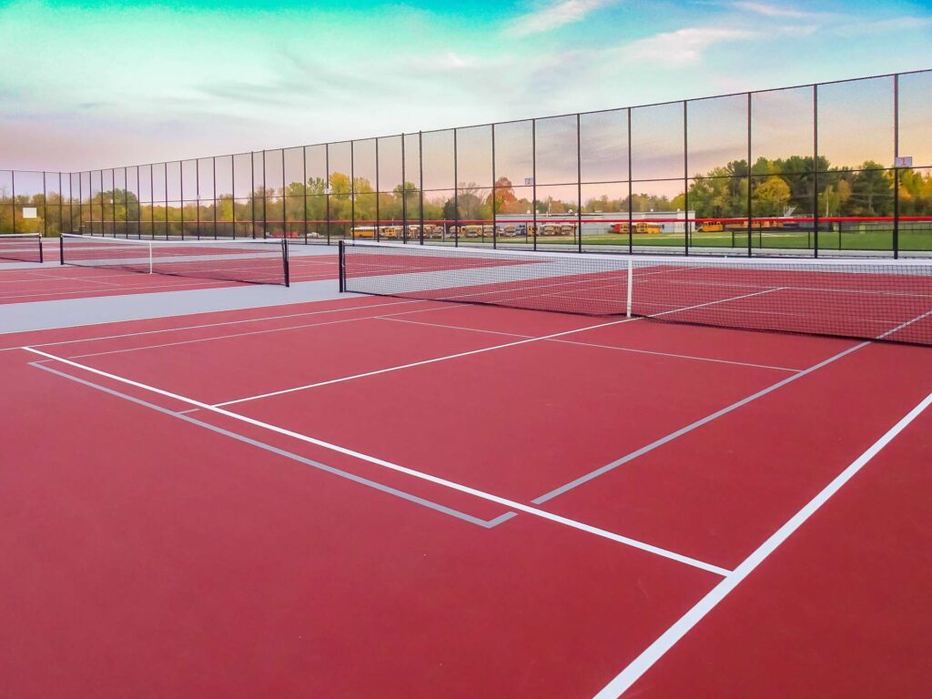 rust colored multi-use tennis and pickleball courts